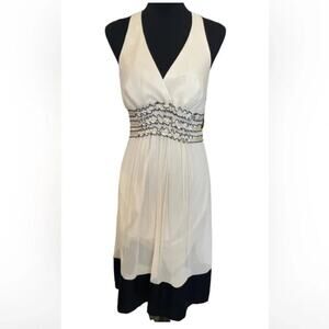 BCBG Maxazria 100% silk cream colored halter dress, size 8P